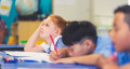 children listening at school 767x418